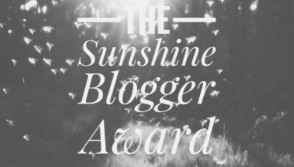 Featured Images - Photo of a sunny day with the words The Sunshine Blogger Award.
