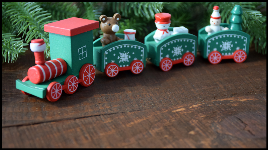 Photo of a small red and green wooden toy train
